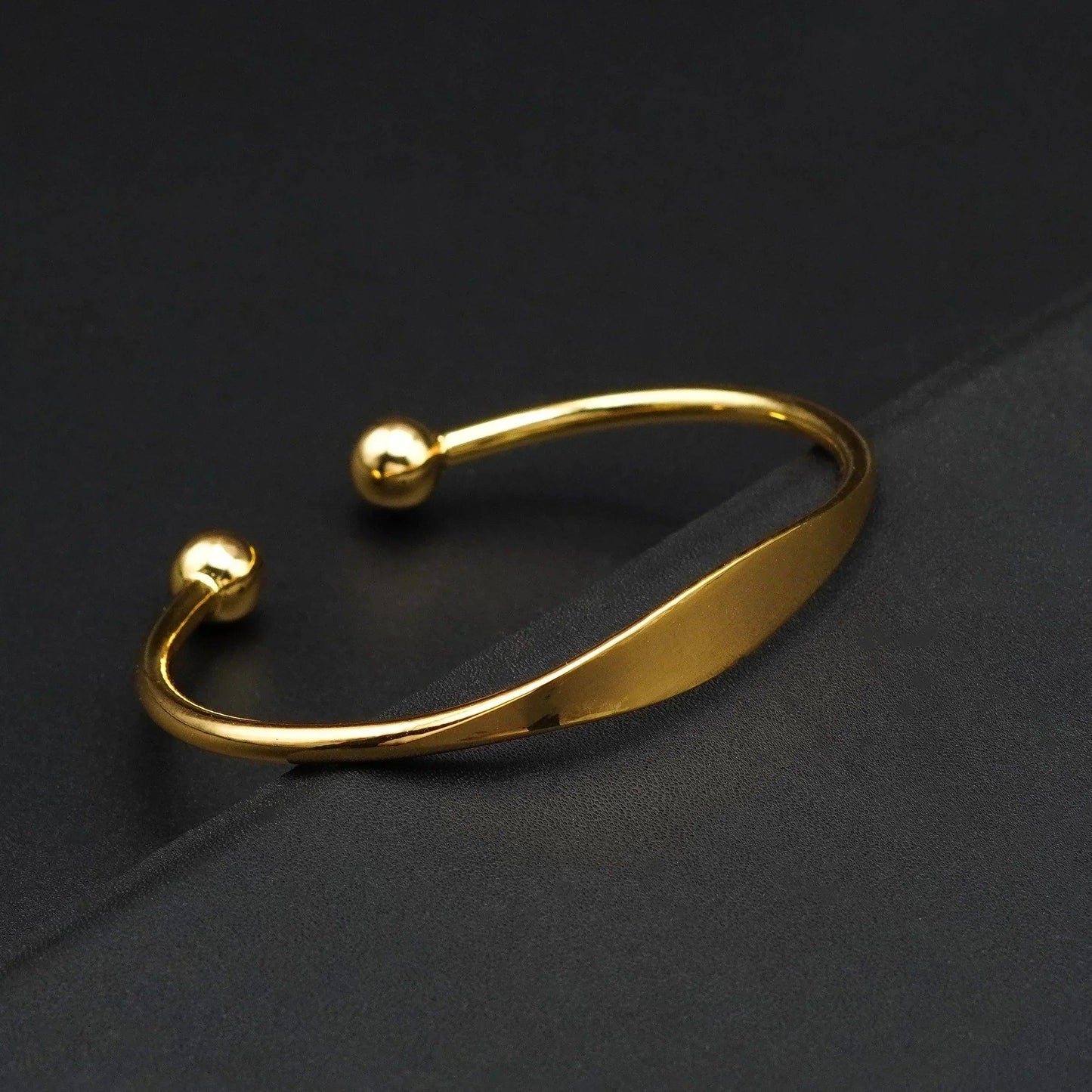 Elegance Gold-Tone Open Bangle Bracelet